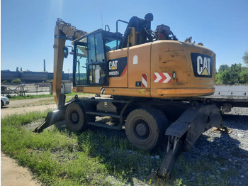حفار ذو عجلات CATERPILLAR MH3024
