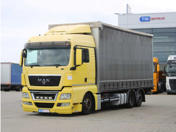 شاحنة ذات ستائر جانبية MAN TGX 24.440
