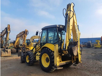 لودر ذو محراث خلفي/ باكهو New Holland B 100 B: صورة 3