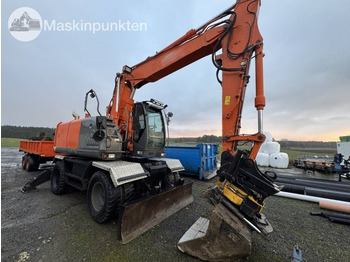 حفار ذو عجلات Hitachi ZX 140 W-3 Med vagn och redskap!: صورة 4 حفار ذو عجلات Hitachi ZX 140 W-3 Med vagn och redskap!: صورة 4