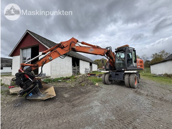حفار ذو عجلات HITACHI ZX140W-3