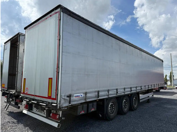 نصف مقطورة بستائر جانبية SCHMITZ SCB