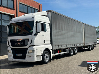 شاحنة ذات ستائر جانبية MAN TGX 26.480