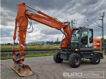 حفار ذو عجلات HITACHI ZX140W-3