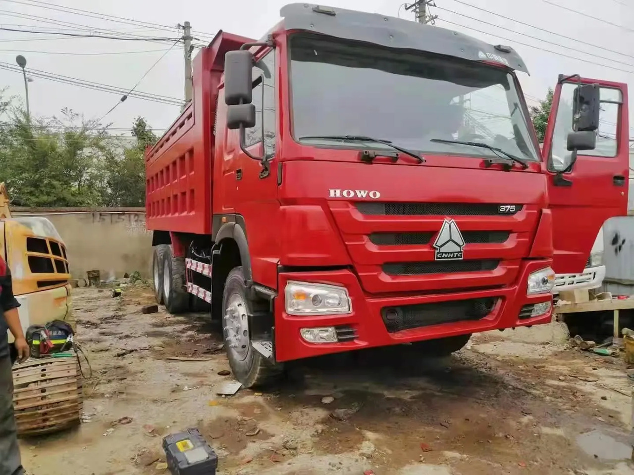 شاحنة قلاب used sinotruk howo 40 ton 20 cubic meter dump truck 6x4 8x4 380hp 10 wheel 12 wheel dump truck for sale: صورة 3