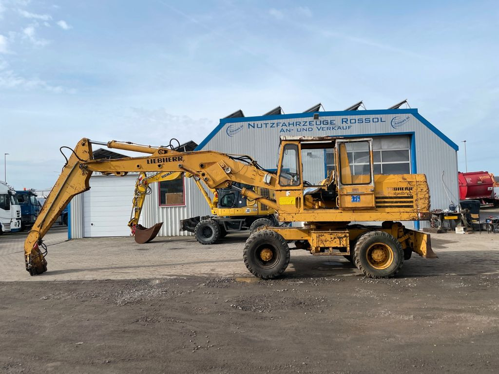 Liebherr A 911 C A911C Umschlagbagger Magnet-Generator - حفار ذو عجلات: صورة 1 Liebherr A 911 C A911C Umschlagbagger Magnet-Generator - حفار ذو عجلات: صورة 1