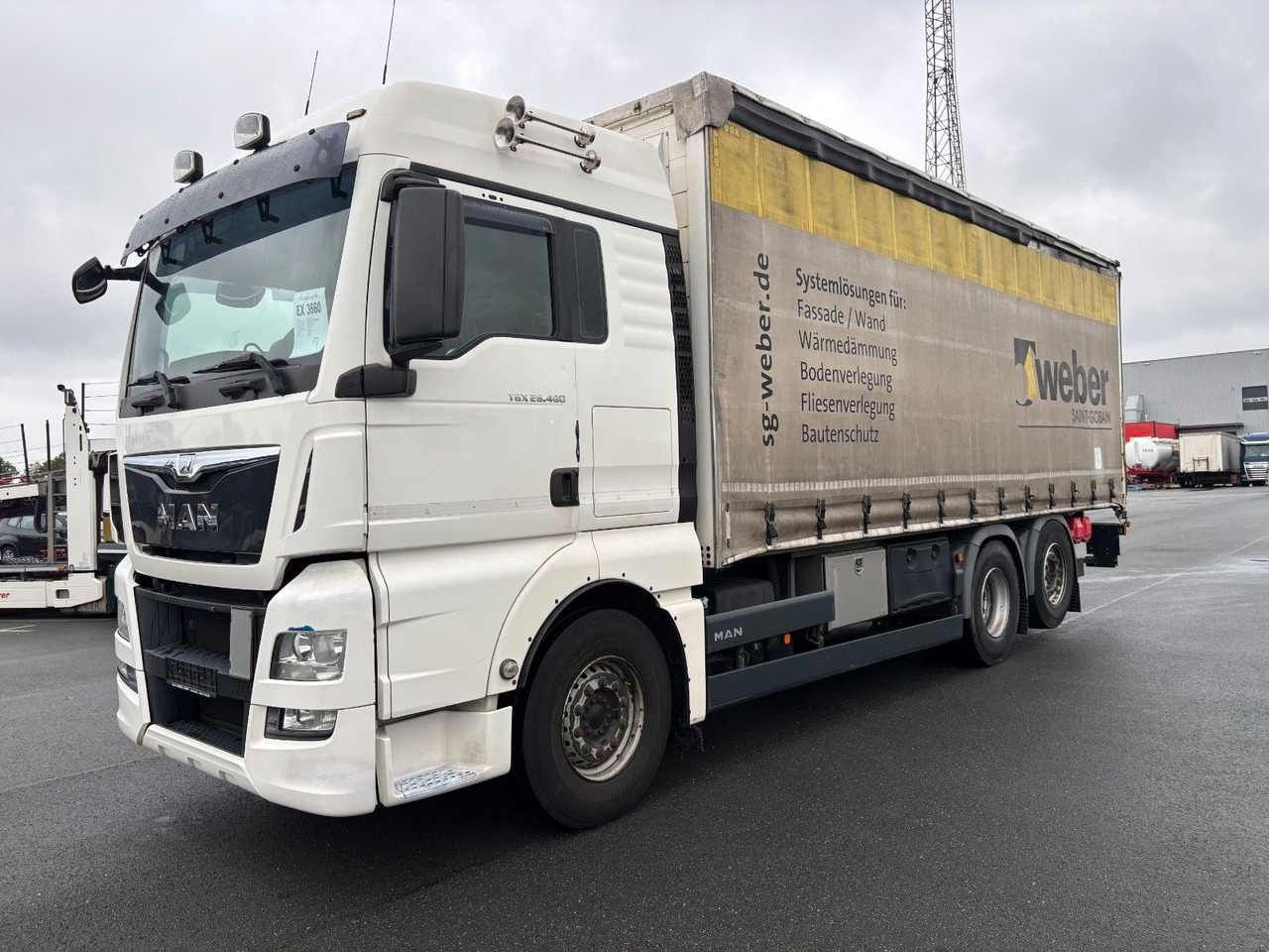 MAN TGX 26.480 mit Ladebordwand - شاحنة ذات ستائر جانبية: صورة 1 MAN TGX 26.480 mit Ladebordwand - شاحنة ذات ستائر جانبية: صورة 1