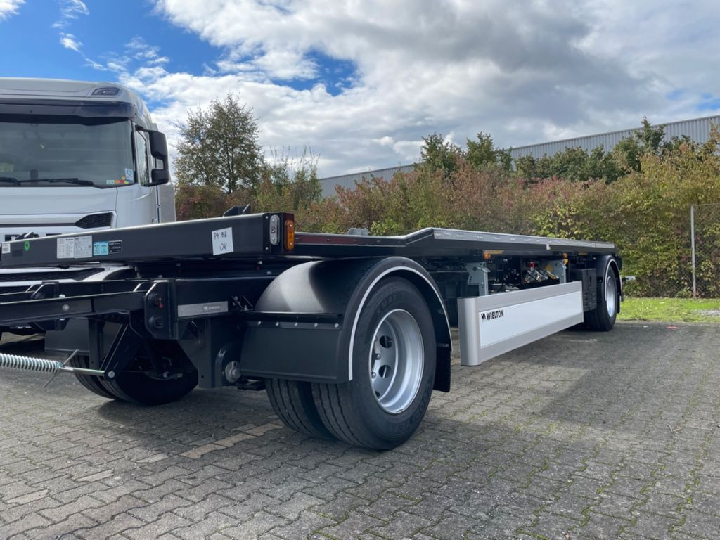 Wielton 2-Achs Außenroller-Abrollanhänger Wielton 2-Achs Außenroller-Abrollanhänger - مقطورة هوك ليفت/ لود لوجر: صورة 1 Wielton 2-Achs Außenroller-Abrollanhänger Wielton 2-Achs Außenroller-Abrollanhänger - مقطورة هوك ليفت/ لود لوجر: صورة 1