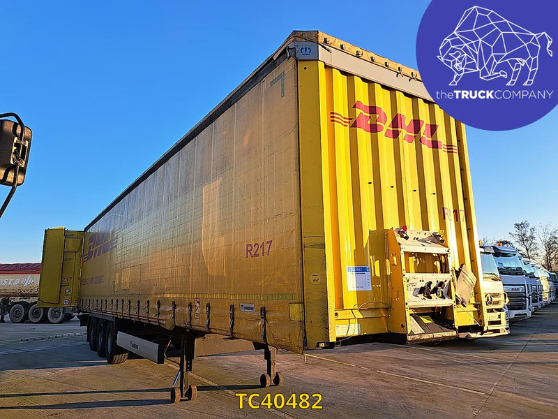 Krone - نصف مقطورة بستائر جانبية: صورة 1 Krone - نصف مقطورة بستائر جانبية: صورة 1