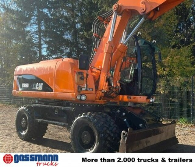 CAT M318D Mobilbagger - آلات الإنشاء: صورة 5 CAT M318D Mobilbagger - آلات الإنشاء: صورة 5