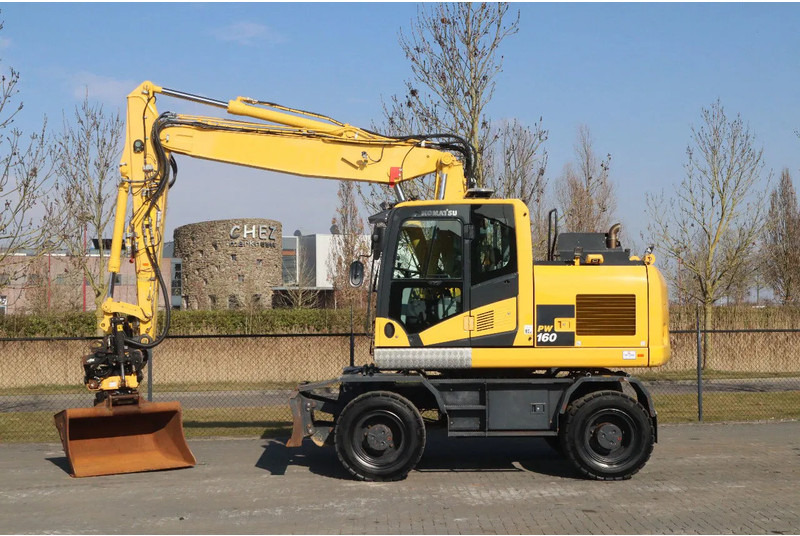 Komatsu PW160-11 | ENGCON TILTROTATOR | BUCKET | TRAILER HYDR. - حفار ذو عجلات: صورة 1 Komatsu PW160-11 | ENGCON TILTROTATOR | BUCKET | TRAILER HYDR. - حفار ذو عجلات: صورة 1