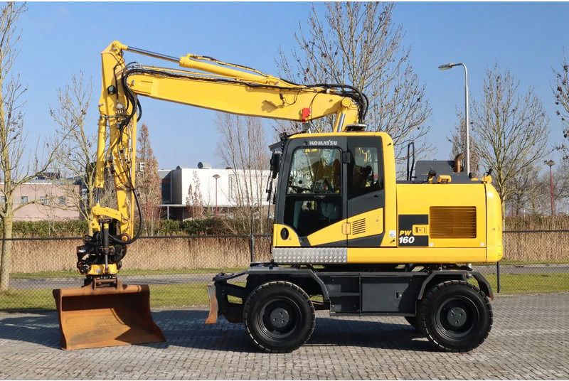 Komatsu PW160-11 | ENGCON TILTROTATOR | BUCKET | TRAILER HYDR. - حفار ذو عجلات: صورة 1 Komatsu PW160-11 | ENGCON TILTROTATOR | BUCKET | TRAILER HYDR. - حفار ذو عجلات: صورة 1