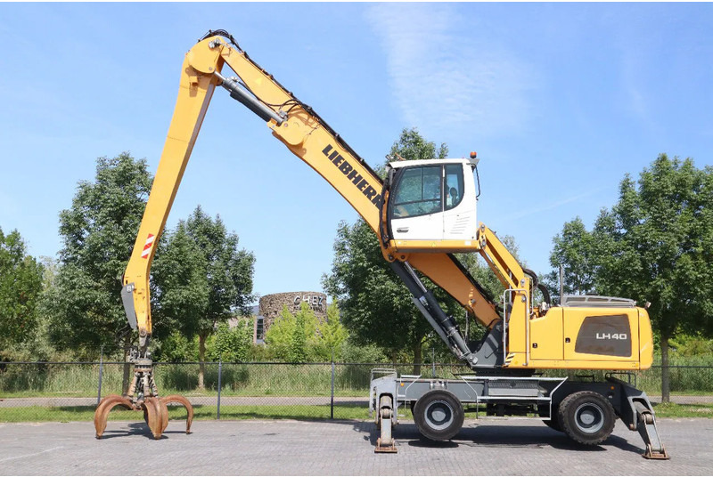 Liebherr LH 40 M LITRONIC | GRAB | QUICK COUPLER | 16 METER - حفار ذو عجلات: صورة 1 Liebherr LH 40 M LITRONIC | GRAB | QUICK COUPLER | 16 METER - حفار ذو عجلات: صورة 1