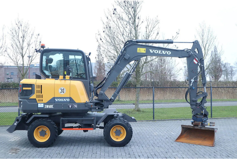 Volvo EW 60 E | DEMO | 30 KM/H | ROTOTILT + GRIPPER | BUCKET - حفار ذو عجلات: صورة 4 Volvo EW 60 E | DEMO | 30 KM/H | ROTOTILT + GRIPPER | BUCKET - حفار ذو عجلات: صورة 4