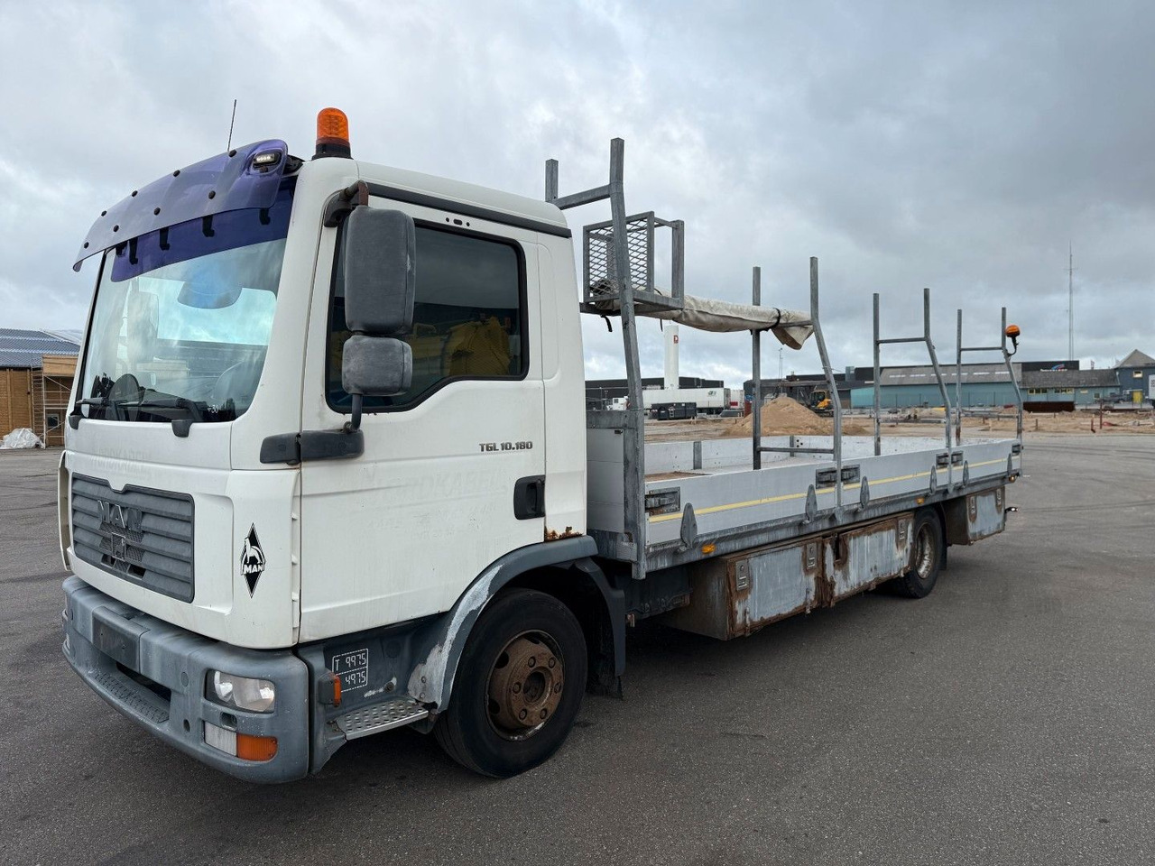 MAN TGL 10.180 4x2 Flatbed 6,80 m. Euro 3 - شاحنات مسطحة: صورة 1 MAN TGL 10.180 4x2 Flatbed 6,80 m. Euro 3 - شاحنات مسطحة: صورة 1