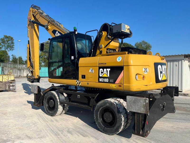 Caterpillar M318D MH - آلة التعامل مع النفايات: صورة 1 Caterpillar M318D MH - آلة التعامل مع النفايات: صورة 1