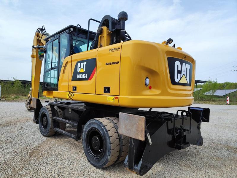 Caterpillar MH3024 EPA zertifiziert - آلة التعامل مع النفايات: صورة 1 Caterpillar MH3024 EPA zertifiziert - آلة التعامل مع النفايات: صورة 1