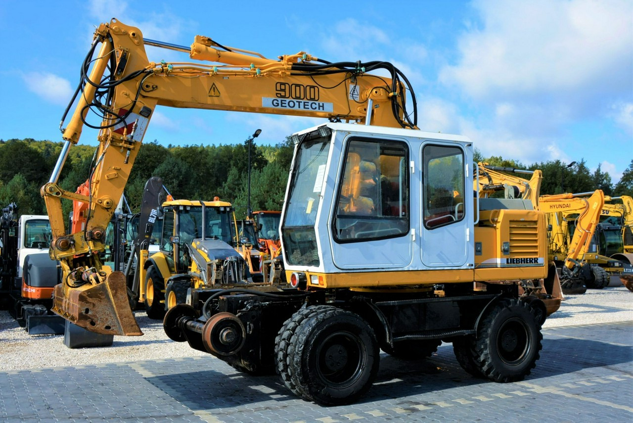 Liebherr A 900 ZW Litronic Koparka + Kolej - حفار ذو عجلات: صورة 1 Liebherr A 900 ZW Litronic Koparka + Kolej - حفار ذو عجلات: صورة 1