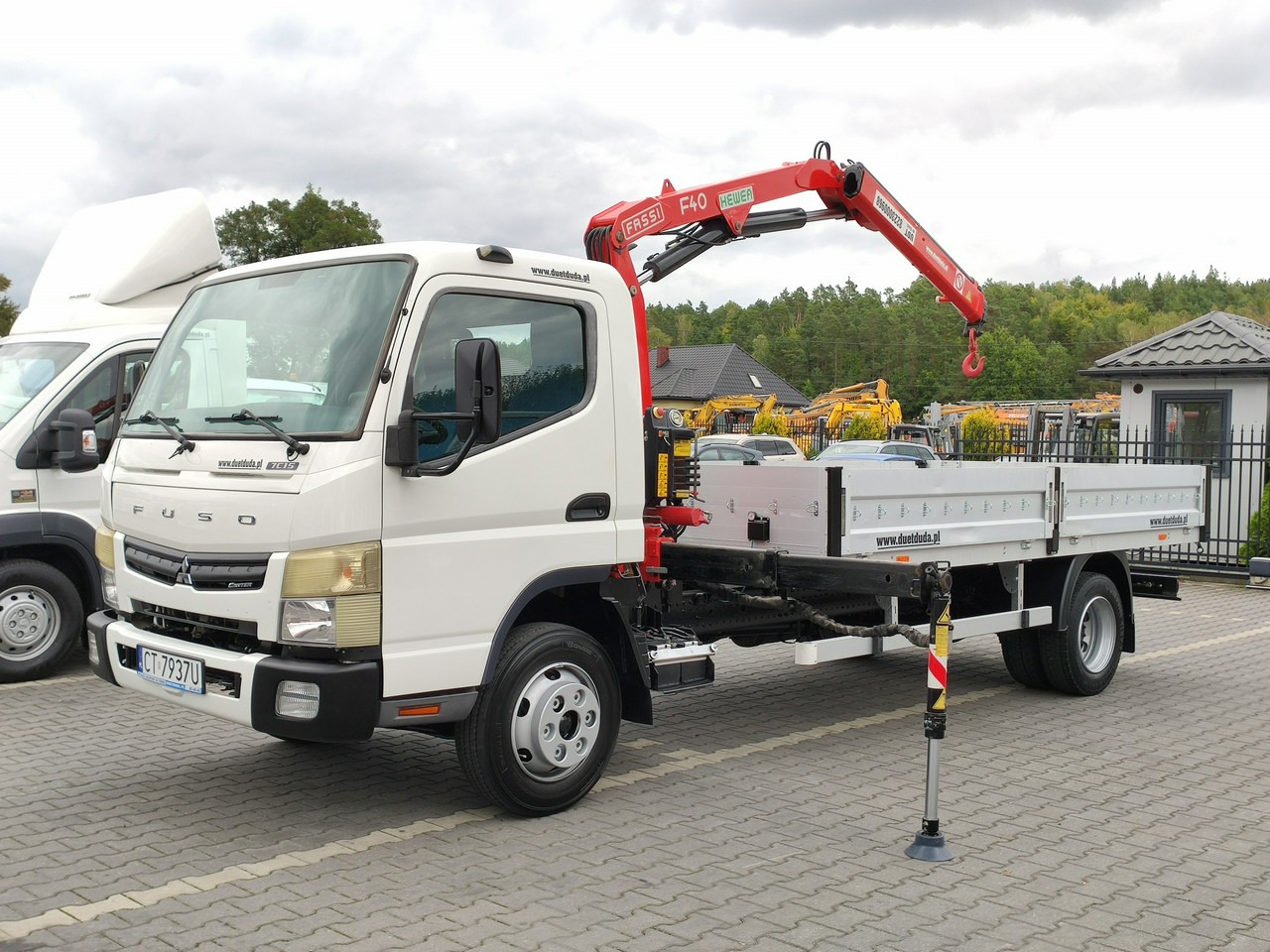 Mitsubishi Canter Fuso 7C15 3.0/150KM HDS FASSI F40 UNIKAT Super Stan !!! - شاحنات مسطحة, شاحنة كرين: صورة 2 Mitsubishi Canter Fuso 7C15 3.0/150KM HDS FASSI F40 UNIKAT Super Stan !!! - شاحنات مسطحة, شاحنة كرين: صورة 2