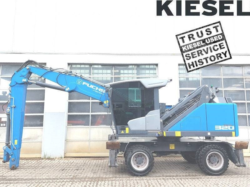 Fuchs MHL 320 F - آلة التعامل مع النفايات: صورة 1 Fuchs MHL 320 F - آلة التعامل مع النفايات: صورة 1