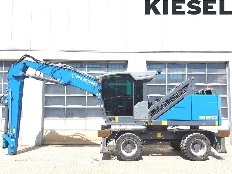Fuchs MHL 320 F - آلة التعامل مع النفايات: صورة 1 Fuchs MHL 320 F - آلة التعامل مع النفايات: صورة 1