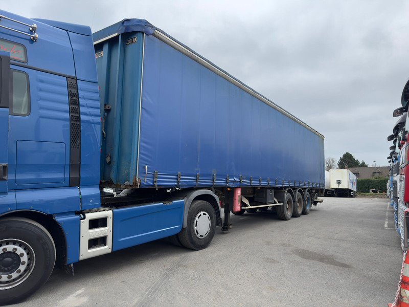 Fruehauf - نصف مقطورة بستائر جانبية: صورة 1 Fruehauf - نصف مقطورة بستائر جانبية: صورة 1