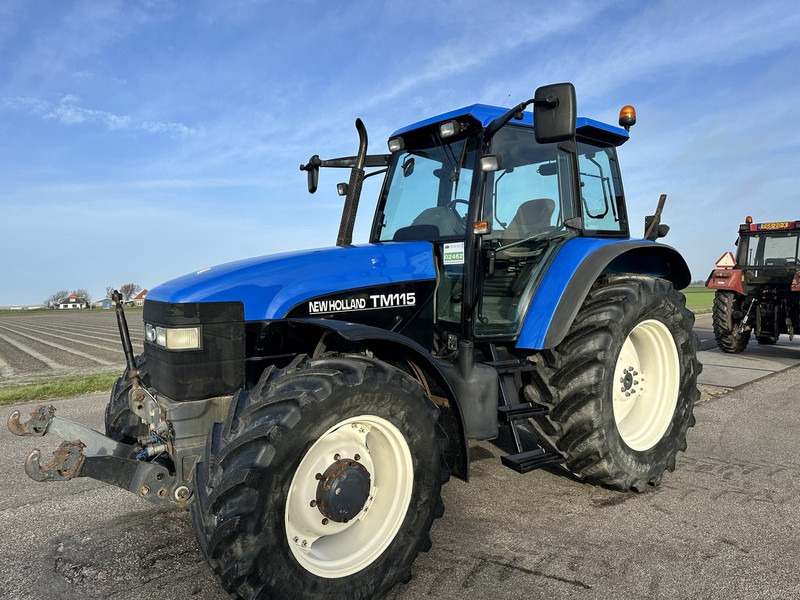 New Holland TM 115 - جرار: صورة 1 New Holland TM 115 - جرار: صورة 1