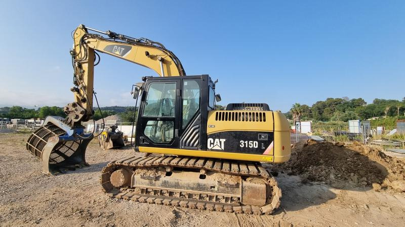 Caterpillar 315DL - حفار زاحف: صورة 1 Caterpillar 315DL - حفار زاحف: صورة 1