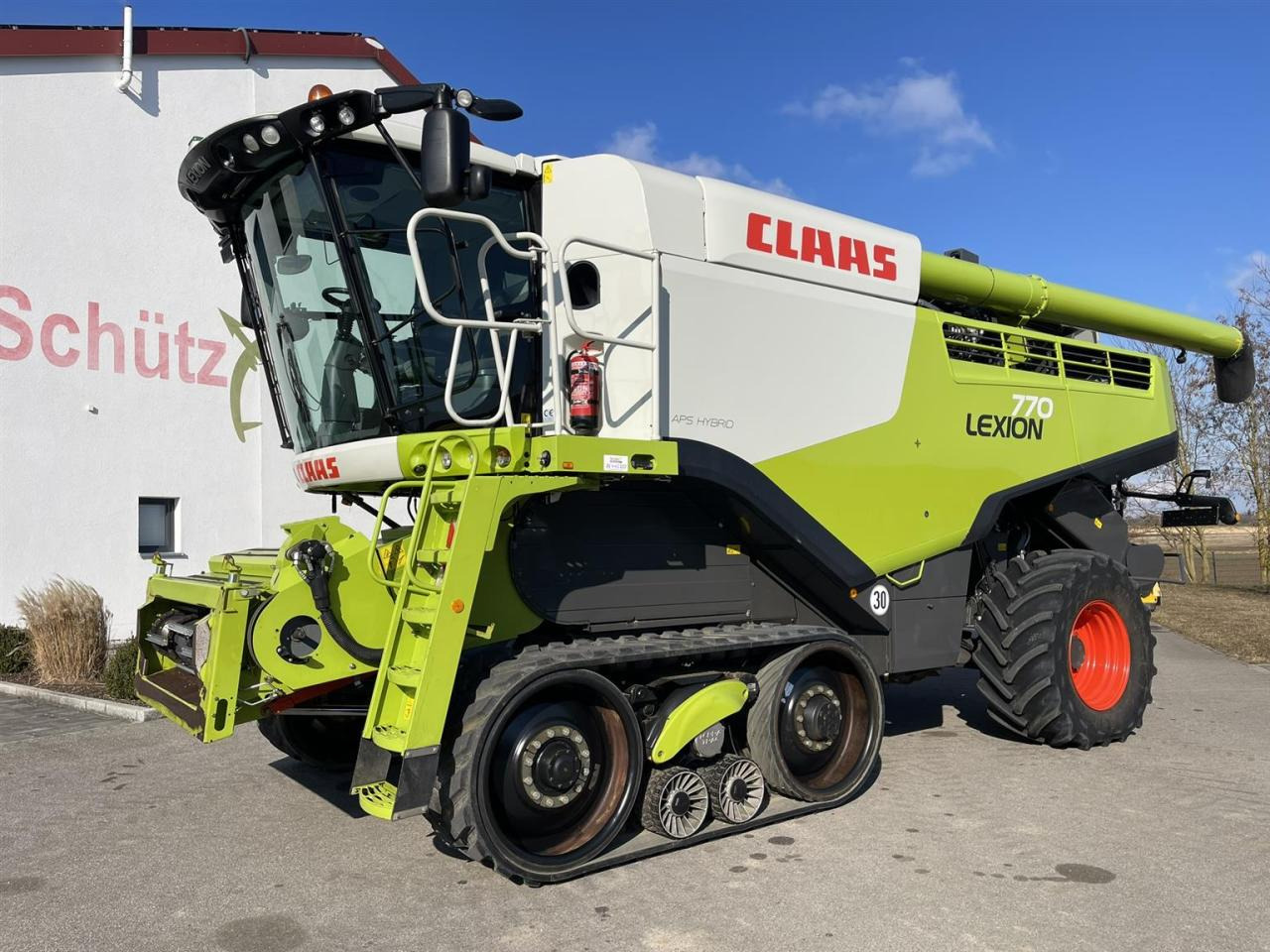 CLAAS Lexion 770TT Modell C76 mit CEMOS AUTOMATIC und Schneidwerk V1230 - حصادة: صورة 1 CLAAS Lexion 770TT Modell C76 mit CEMOS AUTOMATIC und Schneidwerk V1230 - حصادة: صورة 1