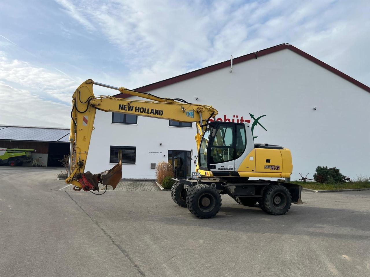 New Holland MH 5.6 inkl. Grabenlöffel, Tieflöffel - حفار ذو عجلات: صورة 3 New Holland MH 5.6 inkl. Grabenlöffel, Tieflöffel - حفار ذو عجلات: صورة 3