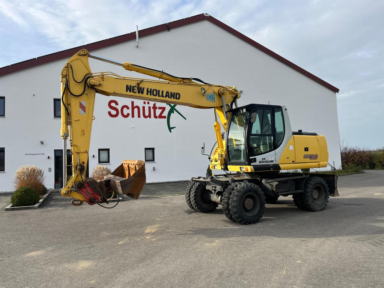 New Holland MH 5.6 inkl. Grabenlöffel, Tieflöffel - حفار ذو عجلات: صورة 2 New Holland MH 5.6 inkl. Grabenlöffel, Tieflöffel - حفار ذو عجلات: صورة 2