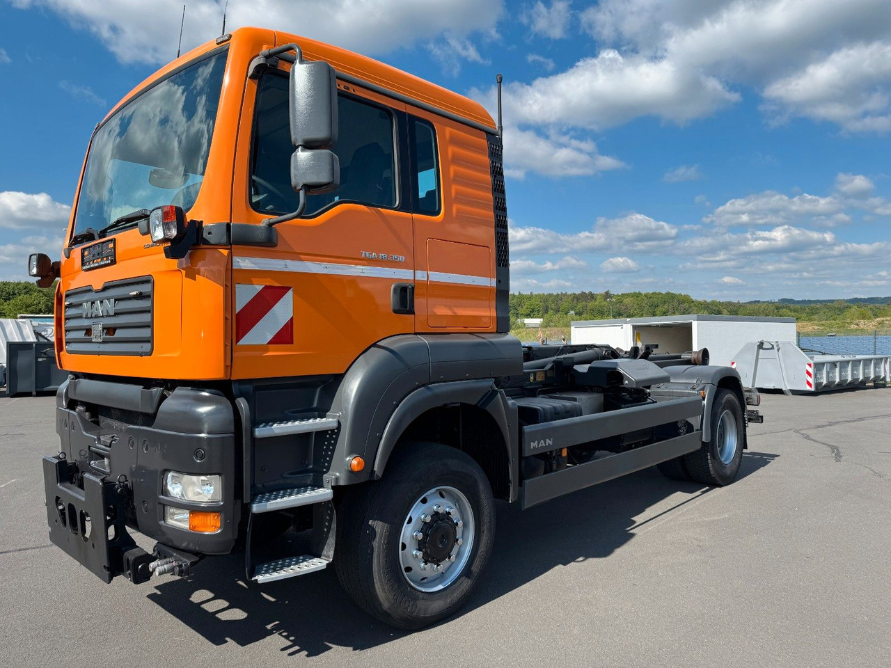 MAN TGA 18.350 4x4 Meiler Abroller RK 14.45 Winterd. - شاحنة برافعة خطافية: صورة 1 MAN TGA 18.350 4x4 Meiler Abroller RK 14.45 Winterd. - شاحنة برافعة خطافية: صورة 1