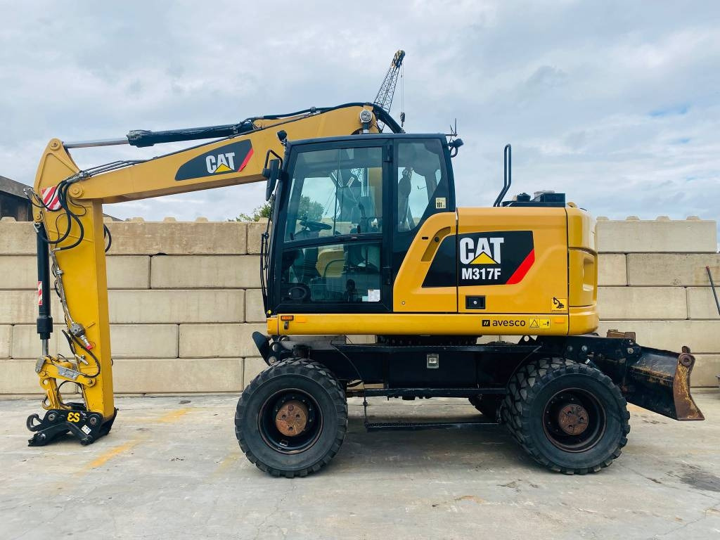 CAT m317f - حفار ذو عجلات: صورة 1 CAT m317f - حفار ذو عجلات: صورة 1