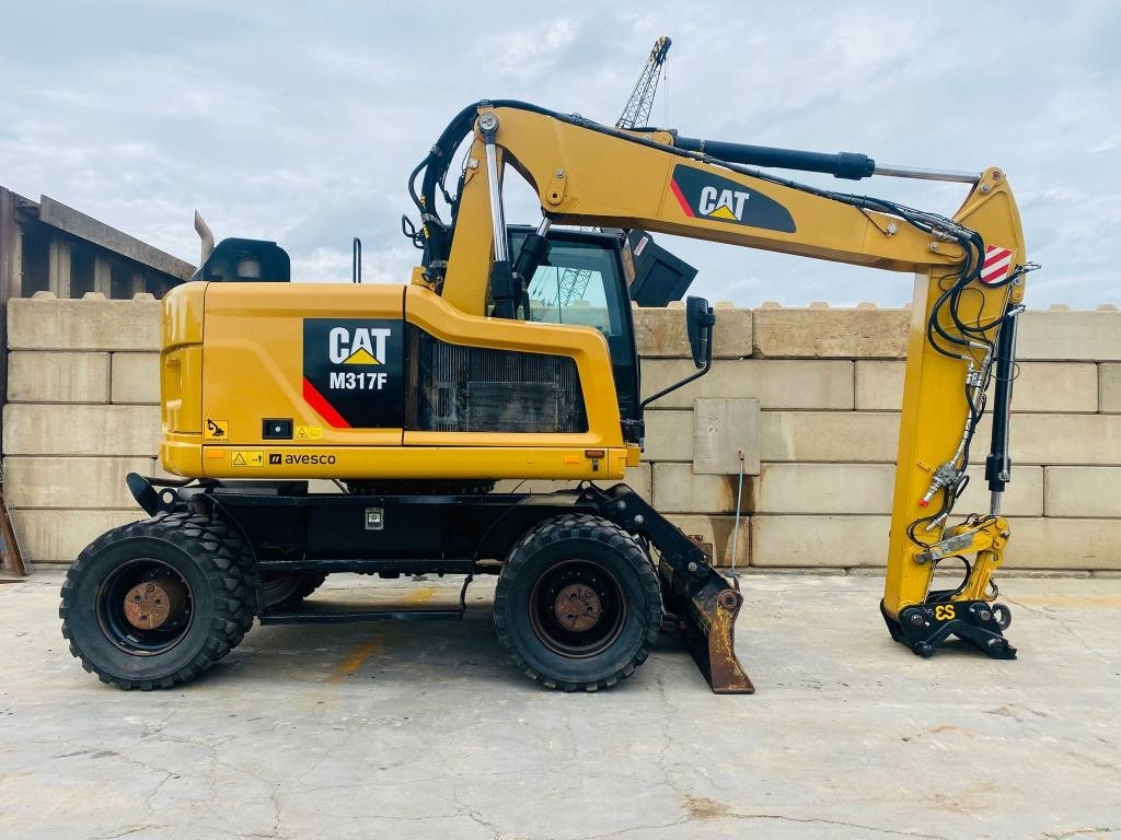 CAT m317f - حفار ذو عجلات: صورة 2 CAT m317f - حفار ذو عجلات: صورة 2