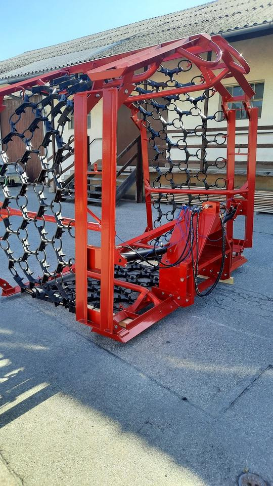 Wiesenegge 6 - 8m Wiesenstriegel Wiesenschleppe Schlepper - مسفلة ذات جنزير: صورة 2 Wiesenegge 6 - 8m Wiesenstriegel Wiesenschleppe Schlepper - مسفلة ذات جنزير: صورة 2