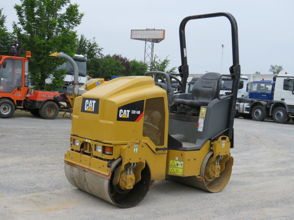 CATERPILLAR Tandem-Vibrationswalze CB14 B Baumaschine - مدحلة: صورة 1 CATERPILLAR Tandem-Vibrationswalze CB14 B Baumaschine - مدحلة: صورة 1