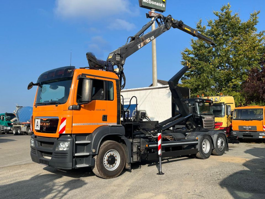 MAN MAN TG-S Abrollkipper mit Kran 26.400 6x4H-2 BL Lift/Lenk - شاحنة برافعة خطافية, شاحنة كرين: صورة 1 MAN MAN TG-S Abrollkipper mit Kran 26.400 6x4H-2 BL Lift/Lenk - شاحنة برافعة خطافية, شاحنة كرين: صورة 1