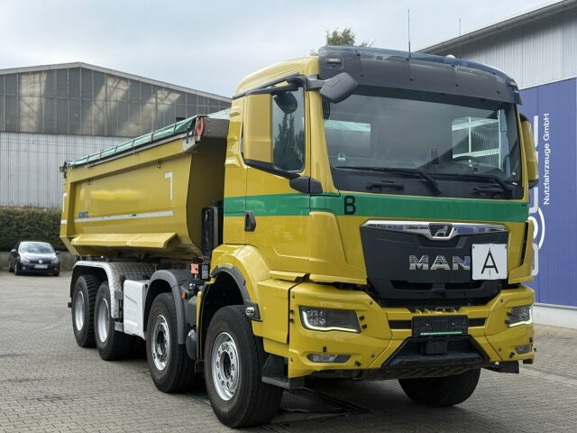 MAN TGS 32.470 8x4 Muldenkipper Schmitz elekt. Plane - شاحنة قلاب: صورة 1 MAN TGS 32.470 8x4 Muldenkipper Schmitz elekt. Plane - شاحنة قلاب: صورة 1