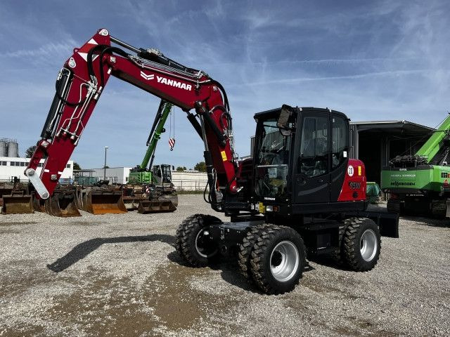 Yanmar B 95W - حفار ذو عجلات: صورة 1 Yanmar B 95W - حفار ذو عجلات: صورة 1