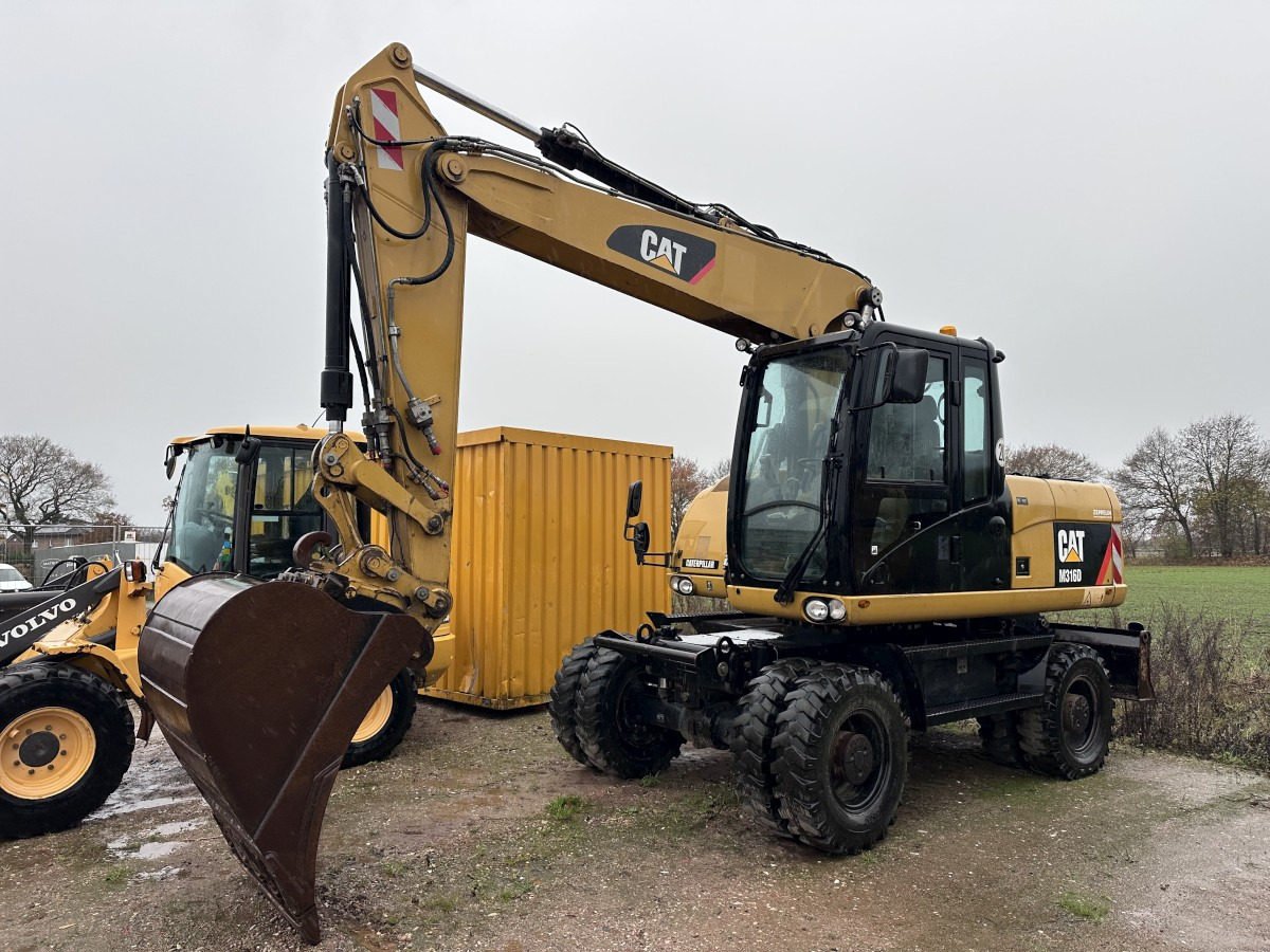 CATERPILLAR M 316 D full Hydr. Top Zustand German machine ! - حفار ذو عجلات: صورة 1 CATERPILLAR M 316 D full Hydr. Top Zustand German machine ! - حفار ذو عجلات: صورة 1