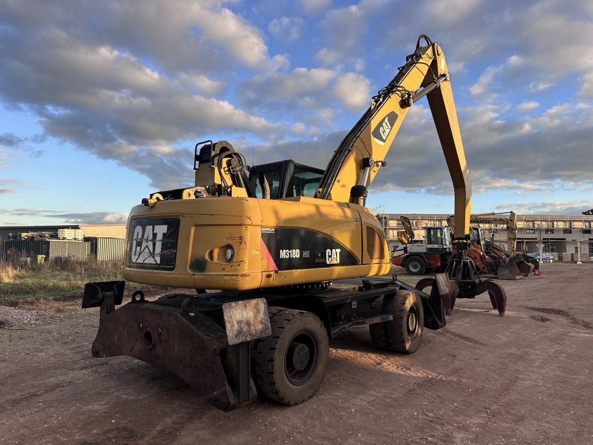CATERPILLAR M 318 MH mit Greifer Kein 3022 3026 320 322 - آلة التعامل مع النفايات: صورة 3 CATERPILLAR M 318 MH mit Greifer Kein 3022 3026 320 322 - آلة التعامل مع النفايات: صورة 3