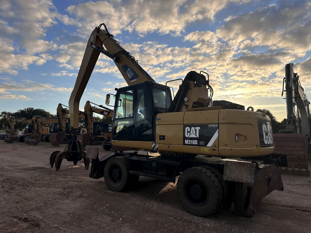 CATERPILLAR M 318 MH mit Greifer Kein 3022 3026 320 322 - آلة التعامل مع النفايات: صورة 4 CATERPILLAR M 318 MH mit Greifer Kein 3022 3026 320 322 - آلة التعامل مع النفايات: صورة 4