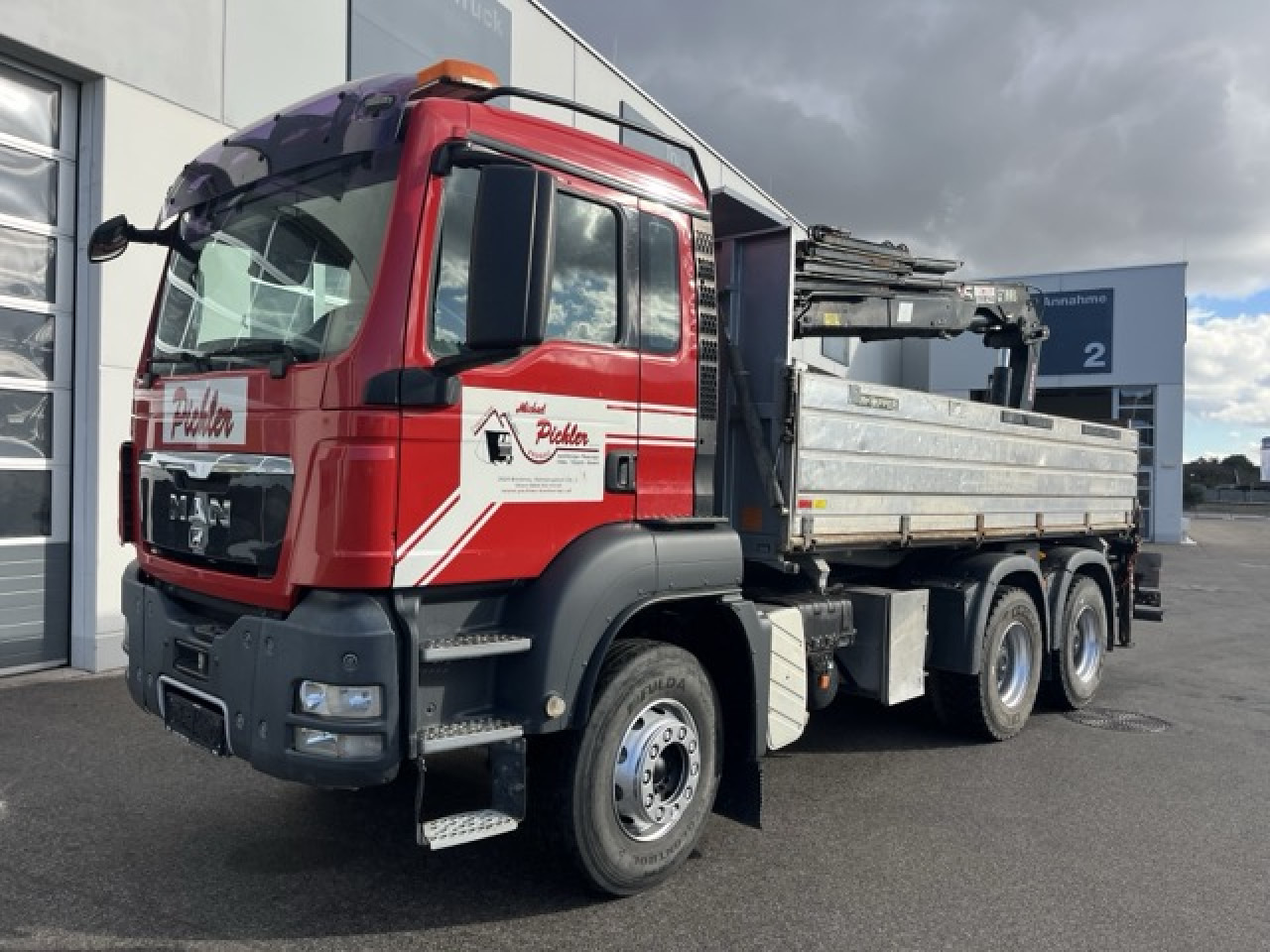 MAN TGS 33.440 6x4 BB mit Heckkran HIAB 166ES-4 Euro5 - شاحنة قلاب, شاحنة كرين: صورة 1 MAN TGS 33.440 6x4 BB mit Heckkran HIAB 166ES-4 Euro5 - شاحنة قلاب, شاحنة كرين: صورة 1
