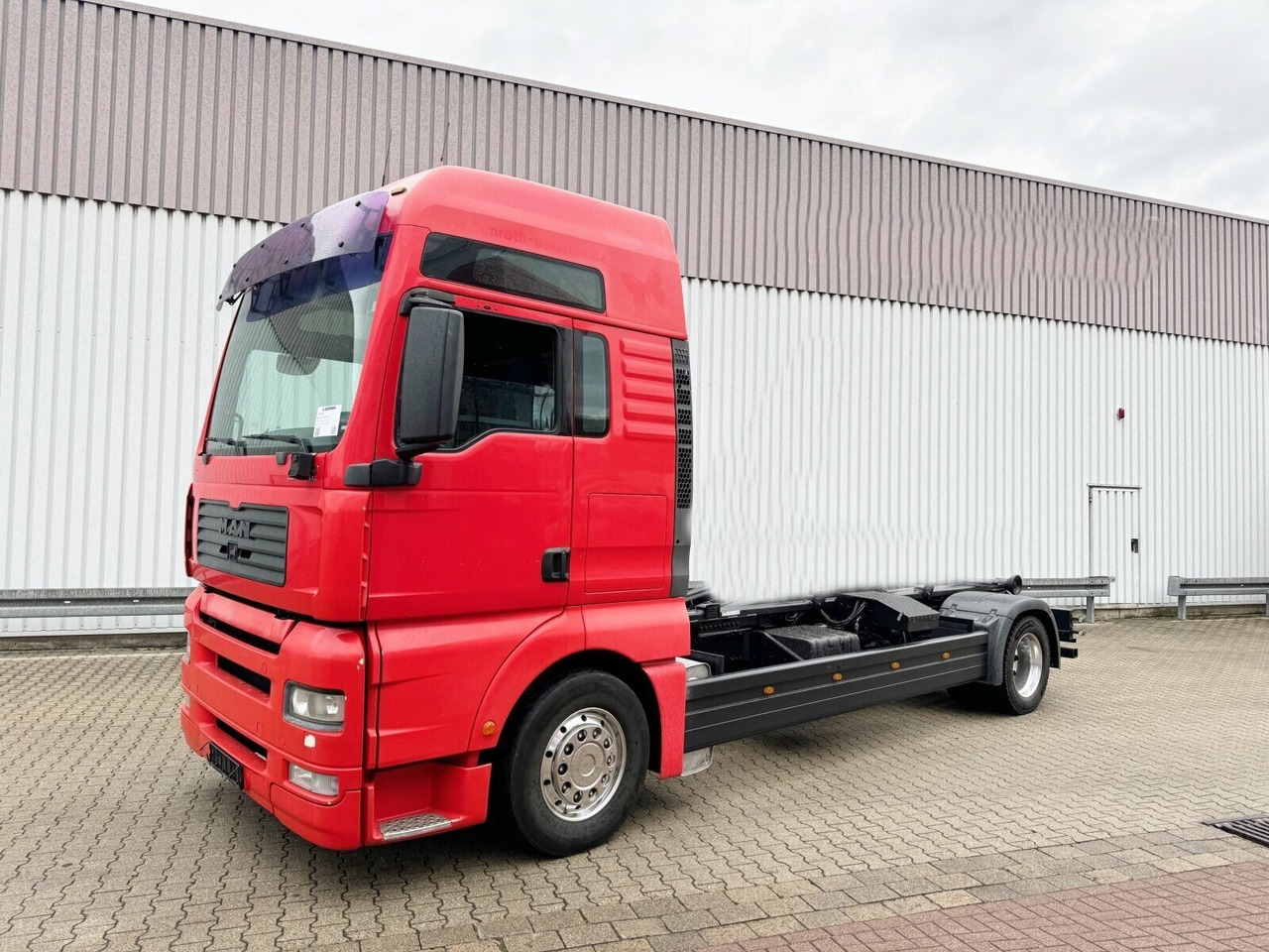 MAN TGA 18.430 4X2 LL TGA 18.430 4X2 LL, 2x AHK - شاحنة برافعة خطافية: صورة 1 MAN TGA 18.430 4X2 LL TGA 18.430 4X2 LL, 2x AHK - شاحنة برافعة خطافية: صورة 1