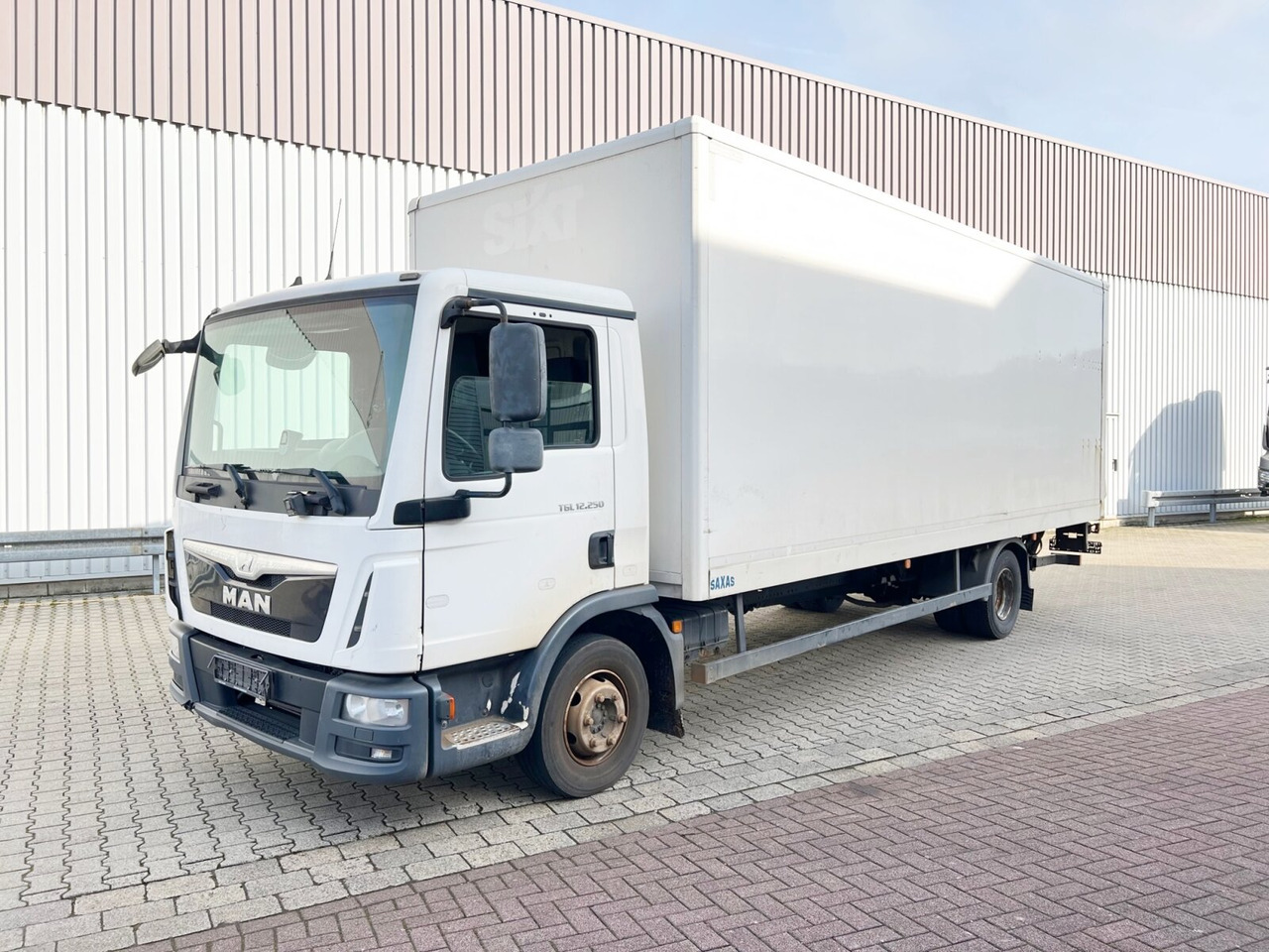 MAN TGL 12.250/340 4X2 BL TGL 12.250/340 4X2 BL mit Dhollandia LBW, 42 cbm - شاحنة صندوقية: صورة 1 MAN TGL 12.250/340 4X2 BL TGL 12.250/340 4X2 BL mit Dhollandia LBW, 42 cbm - شاحنة صندوقية: صورة 1