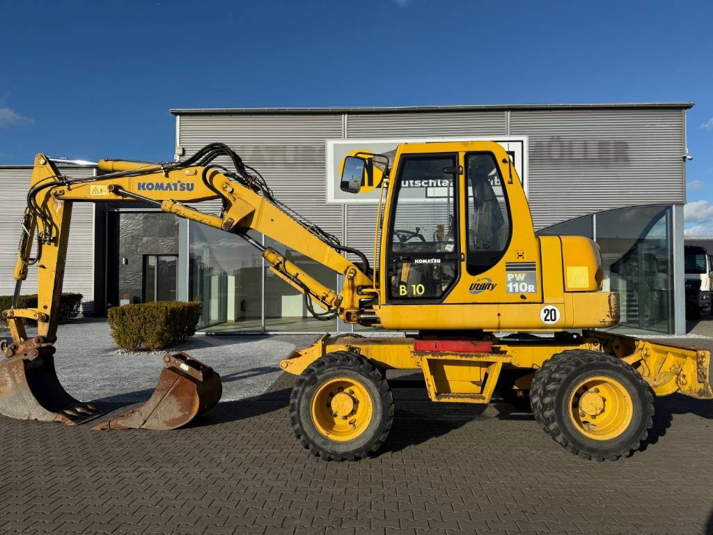Komatsu PW 110 - حفار ذو عجلات: صورة 1 Komatsu PW 110 - حفار ذو عجلات: صورة 1