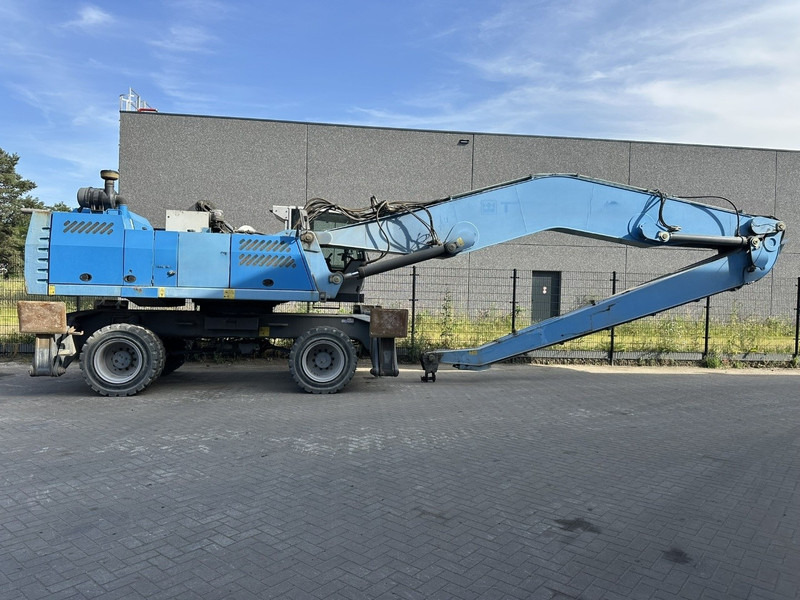 Fuchs MHL 360 OVERSLAGKRAAN / MATERIAL HANDLER / UMSCHLAGBAGGER - TOP ZUSTAND - آلة التعامل مع النفايات: صورة 1 Fuchs MHL 360 OVERSLAGKRAAN / MATERIAL HANDLER / UMSCHLAGBAGGER - TOP ZUSTAND - آلة التعامل مع النفايات: صورة 1