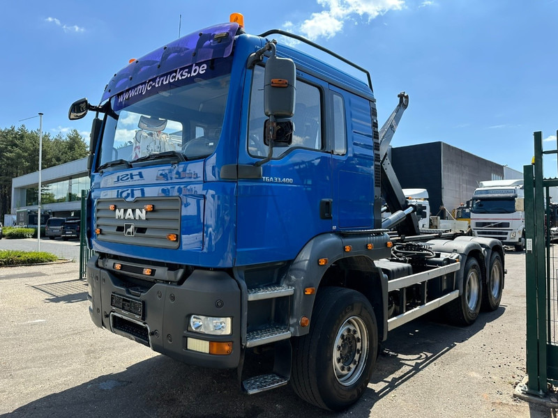 MAN TGA 33.400 6X4 HOOKLIFT AJK NHS20-4930mm - WB 3m60 - MANUAL ZF - STEEL SPRING / BLATT - BIG AXLES / AP ACHSEN - شاحنة برافعة خطافية: صورة 3 MAN TGA 33.400 6X4 HOOKLIFT AJK NHS20-4930mm - WB 3m60 - MANUAL ZF - STEEL SPRING / BLATT - BIG AXLES / AP ACHSEN - شاحنة برافعة خطافية: صورة 3