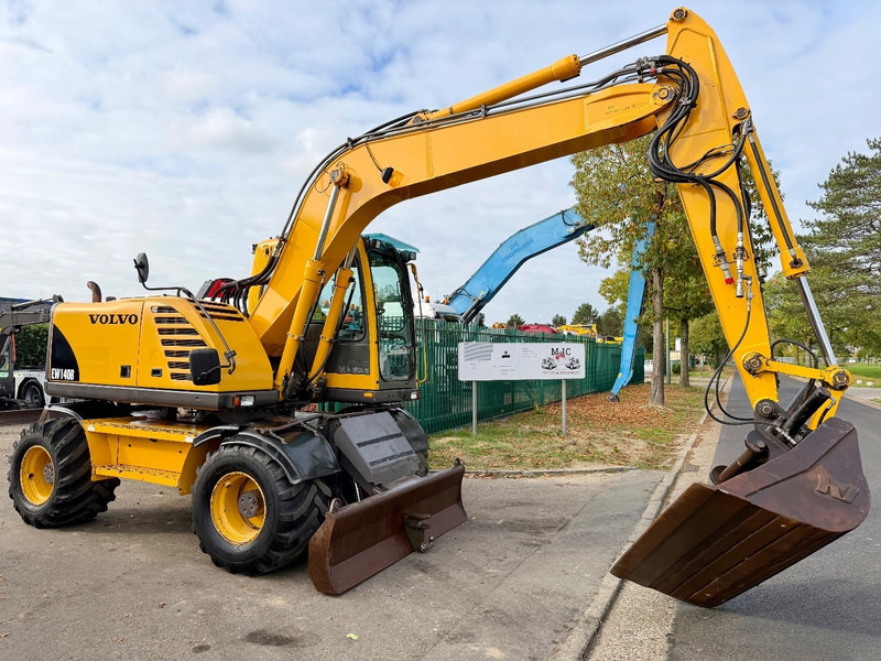 Volvo EW 140 B *FULL HYDR* - BLADE - 10.485h - TILT BUCKET - CE - NL MACHINE - GOOD CONDITION - حفار ذو عجلات: صورة 1 Volvo EW 140 B *FULL HYDR* - BLADE - 10.485h - TILT BUCKET - CE - NL MACHINE - GOOD CONDITION - حفار ذو عجلات: صورة 1