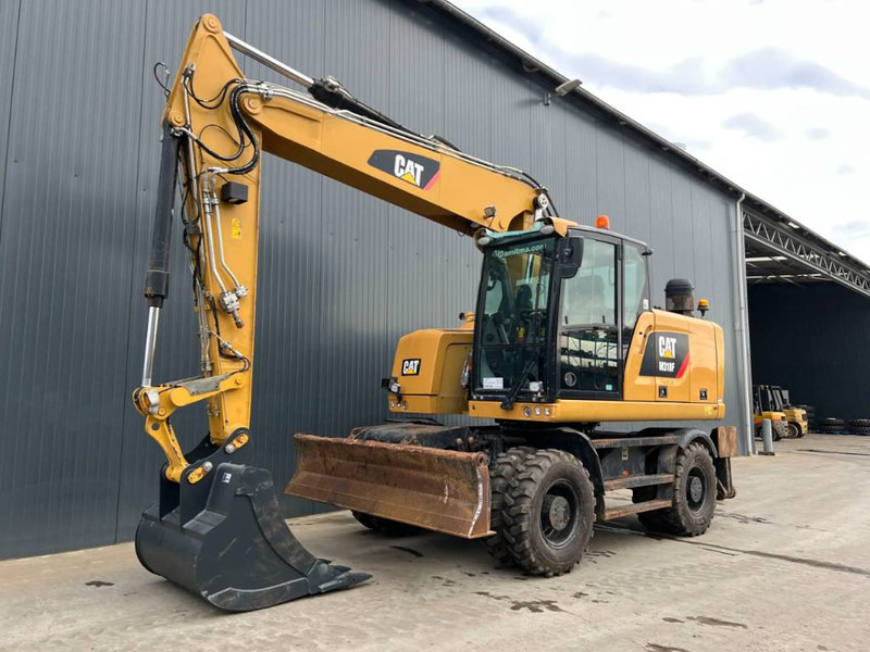 Cat M318F - حفار ذو عجلات: صورة 1 Cat M318F - حفار ذو عجلات: صورة 1